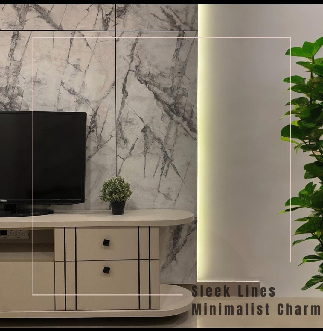 Modern TV unit with marble backdrop and minimalist design